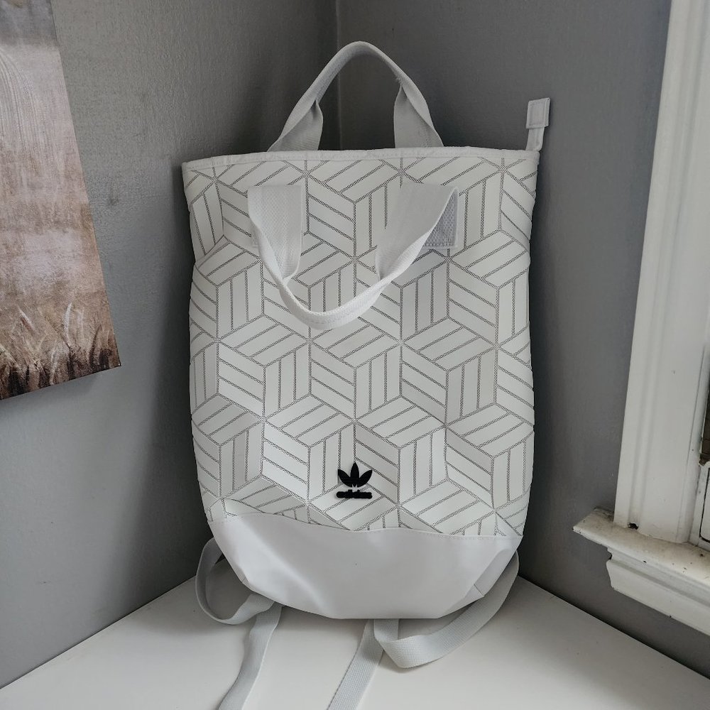 Adidas TOP-LOADING BACKPACK WITH A TRANSPARENT MONOGRAM TREFOIL DESIGN. New cond